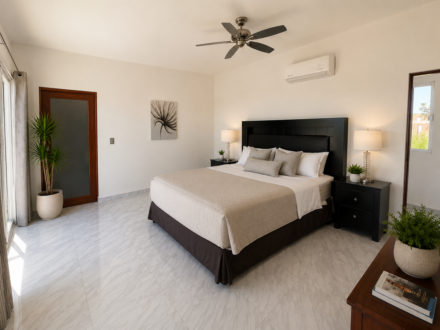 Guest bedroom with king bed, ceiling fan, and ceramic tile floor